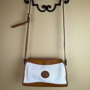 Dooney & Bourne vintage adjustable crossbody purse. Pebbled cream leather.